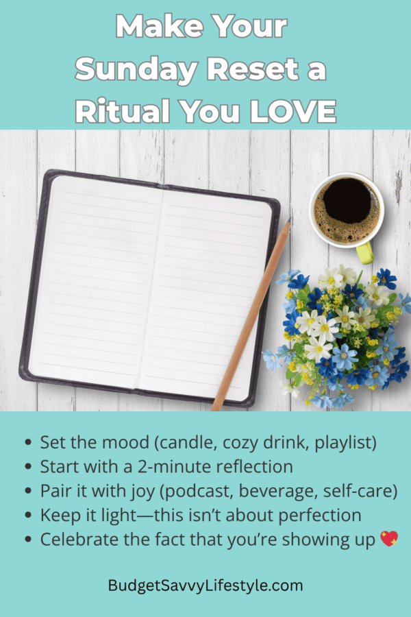 A planner on a desk with a cup of tea and some flowers.